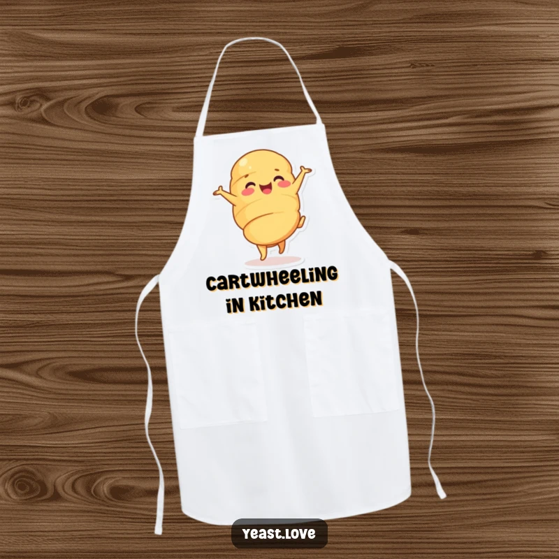 Funny croissant apron showing a happy pastry character in a cheerful cartwheel. Humorous and practical kitchen wear.