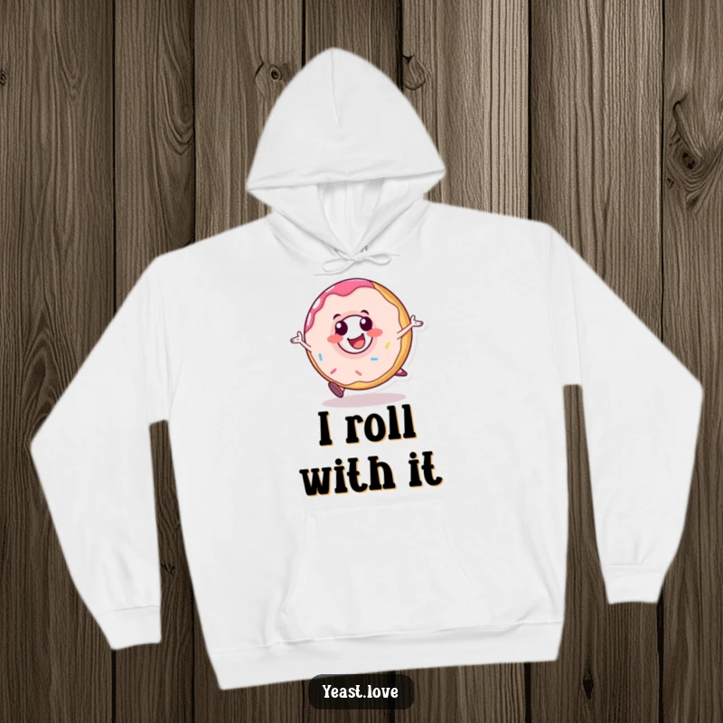Funny donut hoodie featuring a happy dessert character rolling with glee. Cozy and humorous outerwear.