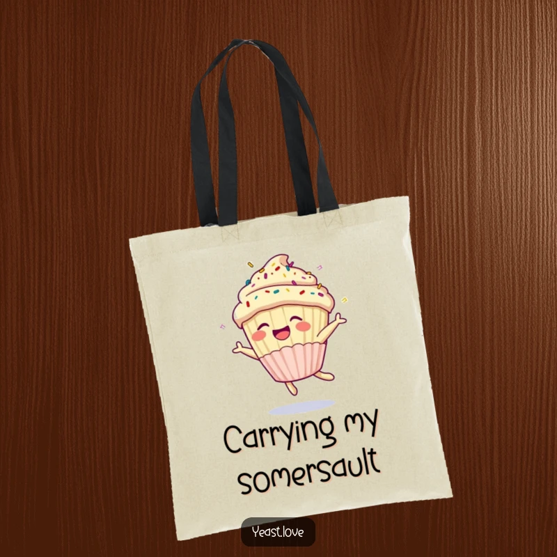 Funny cupcake tote bag with a joyful character doing a somersault amidst sprinkles. A practical and humorous accessory for dessert lovers.